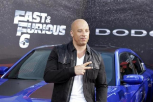 Cast member and producer Vin Diesel poses at the premiere of the new film, ''Fast & Furious 6'' at Universal Citywalk in Los Angeles May 21, 2013.<br />
Reuters/Fred Prouser<br />
 <br/>Reuters