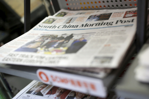 Copies of the South China Morning Post (SCMP) newspaper are seen on a newspaper stand in Hong Kong, China November 26, 2015.  <br/>Reuters