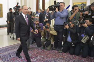 Russian President Vladimir Putin walks before meeting his Iranian counterpart Hassan Rouhani in Tehran, Iran, November 23, 2015. REUTERS/Alexei Druzhinin/Sputnik/Kremlin <br/>