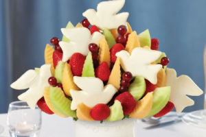 For last-minute Christmas gifts for Christians, there is still time to order and send a peace and dove bouquet, such as the one pictured from Edible Arrangements. Other convenient rush items include certificates and gift cards, provided in creative packaging. <br/>Edible Arrangements