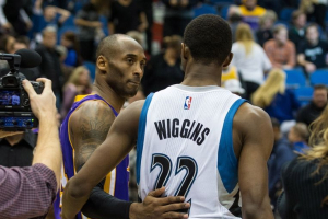 Dec 14, 2014; Minneapolis, MN, USA; Los Angeles Lakers guard Kobe Bryant (24) and Minnesota Timberwolves guard Andrew Wiggins (22) meet following the game at Target Center. The Lakers defeated the Timberwolves 100-94. Mandatory Credit: Brace Hemmelgarn-USA TODAY Sports <br/>