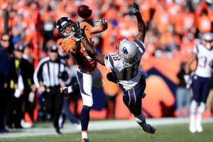 January 19, 2014; Denver, CO, USA; Denver Broncos cornerback Tony Carter (32) breaks up a pass intended for New England Patriots wide receiver Matthew Slater (18) in the first half of the 2013 AFC Championship football game at Sports Authority Field at Mile High. Mandatory Credit: Ron Chenoy-USA TODAY Sports <br/>