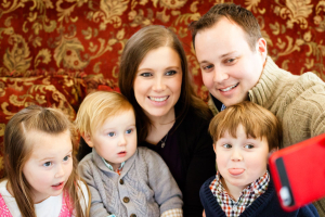 Anna and Josh Duggar pictured with three of their four children. <br/>AP photo