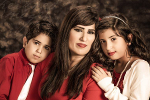 Naghmeh Abedini pictured with her two children. <br/>Facebook