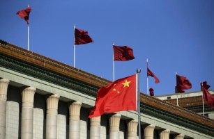Chinese flag waves in front of the Great Hall of the People in Beijing, China, October 29, 2015.  <br/>Reuters