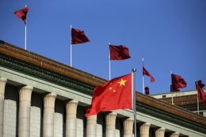 Chinese flag waves in front of the Great Hall of the People in Beijing, China, October 29, 2015.  <br/>Reuters