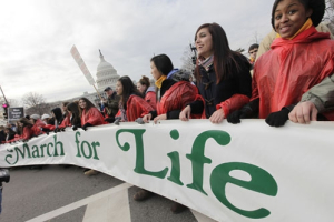 Pro-life demonstrators walk in front of the Capitol in Washington, Friday, Jan. 22, 2010. Pro-lifers are rallying in Washington on the anniversary of the U.S. Supreme Court's Roe v. Wade decision. <br/>AP Images / Pablo Martinez Monsivais