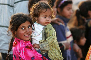 Iraqi refugee children caught in the crossfire between rebels and the government. Wikimedia Commons/James Gordon<br />
<br />
 <br/>