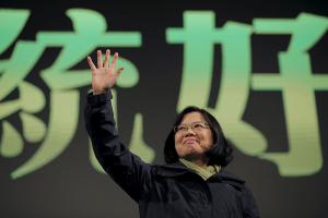 Democratic Progressive Party (DPP) Chairperson and presidential candidate Tsai Ing-wen waves to her supporters after her election victory at party headquarters in Taipei, Taiwan January 16, 2016. REUTERS/Damir Sagolj <br/>