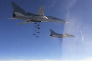 Russian Tupolev TU-22 long-range strategic bombers conduct an air strike at an unknown location in Syria. Still image taken from video footage <br/>Reuters