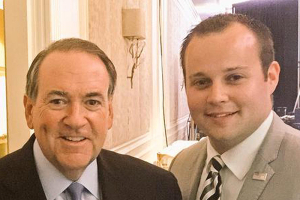 Republican presidential candidate Mike Huckabee pictured with embattled reality star Josh Duggar <br/>People Magazine