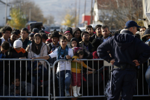 Migrants wait to register with the police at the refugee center in Presevo, Serbia. (AP Photo / Darko Vojinovic) <br/>
