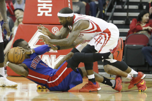 Jan 20, 2016; Houston, TX, USA; Detroit Pistons guard Reggie Jackson (1) is defended by Houston Rockets guard Ty Lawson (3) in the second quarter at Toyota Center. Mandatory Credit: Thomas B. Shea-USA TODAY Sports <br/>Reuters/Thomas Shea