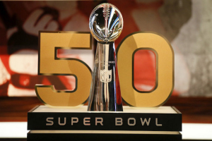 The Vince Lombardi Trophy and the 50 numerical symbol indicating the celebration of upcoming Super Bowl 50. (Danny Moloshok/AP) <br/>