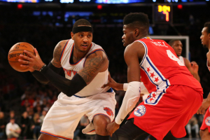 Jan 18, 2016; New York, NY, USA; Philadelphia 76ers forward Nerlens Noel (4) defends New York Knicks forward Carmelo Anthony (7) during the first overtime at Madison Square Garden. New York Knicks won 119-113 in double overtime.  <br/>Anthony Gruppuso-USA TODAY Sports