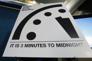 A sign showing the 'Doomsday Clock' that remains at three minutes to midnight is seen after it was unveiled by the Bulletin of the Atomic Scientists <br/>