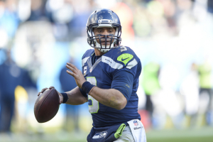 Jan 17, 2016; Charlotte, NC, USA; Seattle Seahawks quarterback Russell Wilson (3) looks to pass during the fourth quarter against the Carolina Panthers in a NFC Divisional round playoff game at Bank of America Stadium.  <br/>John David Mercer-USA TODAY Sports