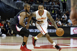Jan 27, 2016; Atlanta, GA, USA; Atlanta Hawks guard Jeff Teague (0) drives against Los Angeles Clippers guard Chris Paul (3) in the third quarter of their game at Philips Arena. The Clippers won 85-83.  <br/>Jason Getz-USA TODAY Sports