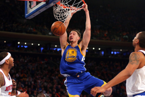 Jan 31, 2016; New York, NY, USA; Golden State Warriors shooting guard Klay Thompson (11) dunks against New York Knicks small forward Carmelo Anthony (7) and Knicks small forward Lance Thomas (42) during the second quarter at Madison Square Garden. The Warriors defeated the Knicks 116-95.  <br/>Brad Penner-USA TODAY Sports