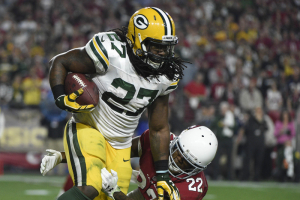 January 16, 2016; Glendale, AZ, USA; Green Bay Packers running back Eddie Lacy (27) runs the ball against Arizona Cardinals strong safety Tony Jefferson (22) during the second half in a NFC Divisional round playoff game at University of Phoenix Stadium.  <br/>Kyle Terada-USA TODAY Sports