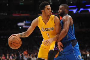 January 26, 2016; Los Angeles, CA, USA; Los Angeles Lakers guard D'Angelo Russell (1) moves the ball against Dallas Mavericks guard Wesley Matthews (23) during the second half at Staples Center.  <br/>Gary A. Vasquez-USA TODAY Sports