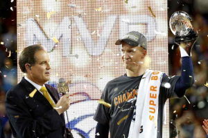 Denver Broncos' quarterback Peyton Manning is interviewed as he holds the Vince Lombardi Trophy after the Broncos defeated the Carolina Panthers in the NFL's Super Bowl 50 football game in Santa Clara, California February 7, 2016.  <br/>REUTERS/Mike Blake