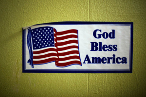 This ''God Bless America'' sign (originally erected in a sign of support after Sept. 11, 2001, terrorist attackes) was taken down last month from a Pittsburg, Kan., post office after Freedom From Religion Foundation lawyers filed a lawsuit regarding the sign's alleged violation of the separation of church and state. Reuters  <br/>
