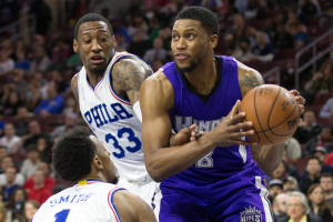 Feb 10, 2016; Philadelphia, PA, USA; Sacramento Kings forward Rudy Gay (8) drives against the defense of Philadelphia 76ers forward Robert Covington (33) and guard Ish Smith (1) during the second quarter at Wells Fargo Center.  <br/>Bill Streicher-USA TODAY Sports
