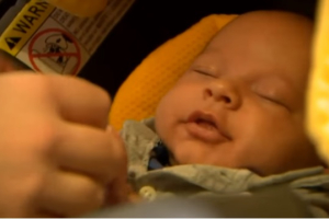Screenshot from news footage featuring Jennifer Melton and her newborn baby.  <br/>YouTube / Blue eyed
