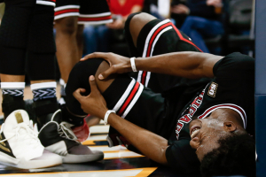 Feb 5, 2016; Denver, CO, USA; Chicago Bulls guard Jimmy Butler (21) grabs his knee after a play in the second quarter against the Denver Nuggets at the Pepsi Center.  <br/>Isaiah J. Downing-USA TODAY Sports