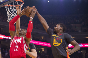 February 9, 2016; Oakland, CA, USA; Houston Rockets center Dwight Howard (12) shoots the basketball against Golden State Warriors forward Harrison Barnes (40) during the first quarter at Oracle Arena. Mandatory Credit: Kyle Terada-USA TODAY Sports<br />
 <br/>