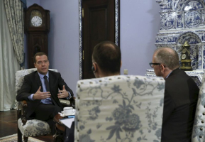 Russian Prime Minister Dmitry Medvedev (L) speaks during an interview at the Gorki state residence outside Moscow, Russia, February 11, 2016. REUTERS/Ekaterina Shtukina/Sputnik/Pool <br/>