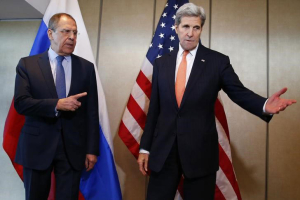 U.S. Foreign Secretary John Kerry and Russian Foreign Minister Sergei Lavrov (L) gesture before their bilateral talks in Munich, Germany, February 11, 2016, ahead of the International Syria Support Group (ISSG) meeting. REUTERS/Michael Dalder <br/>