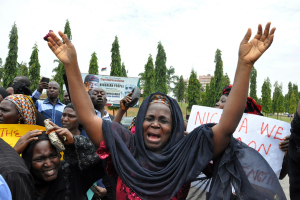 An unidentified mother cries out during a demonstration to raise awareness of kidnapped school girls at a government school on Tuesday April 29, 2014, in Abuja, Nigeria.   <br/>AP Photo/ Gbemiga Olamikan