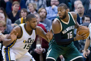 Utah Jazz forward Derrick Favors (15) defends against Milwaukee Bucks center Greg Monroe (15) during the second half at Vivint Smart Home Arena. The Jazz won 84-81.  <br/>Russ Isabella-USA TODAY Sports