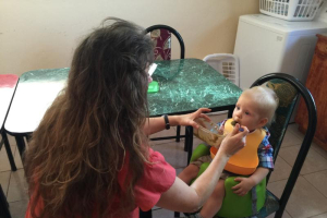 Grandmother Michelle Duggar gladfully spent time with grandson Israel in Central America. <br/>Derick Dillard