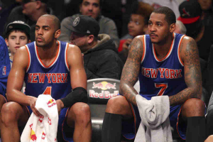 Feb 19, 2016; Brooklyn, NY, USA; New York Knicks shooting guard Arron Afflalo (4) and small forward Carmelo Anthony (7) react on the bench during the fourth quarter against the Brooklyn Nets at Barclays Center. The Nets defeated the Knicks 109-98.  <br/>Brad Penner-USA TODAY Sports