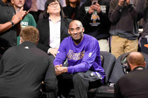 Feb 22, 2016; Milwaukee, WI, USA; Los Angeles Lakers forward Kobe Bryant (24) is surrounded by media for his introduction before game against the Milwaukee Bucks at BMO Harris Bradley Center.  <br/>Benny Sieu-USA TODAY Sports
