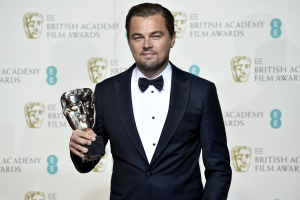 Leonardo DiCaprio holds his award for best leading actor at the British Academy of Film and Television Arts (BAFTA) Awards at the Royal Opera House in London, February 14, 2016. REUTERS/Toby Melville <br/>
