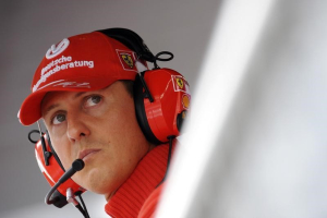 Former Ferrari driver Michael Schumacher of Germany looks on during the qualifying session for the Italian F1 Grand Prix race at the Monza racetrack in Monza, near Milan, in this September 13, 2008 file photo. REUTERS/Alessandro Bianchi <br/>