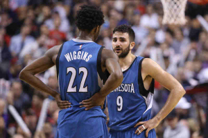 Toronto, Ontario, CAN; Minnesota Timberwolves point guard Ricky Rubio (9) talks to forward Andrew Wiggins (22) against the Toronto Raptors at Air Canada Centre. The Raptors beat the Timberwolves 114-105.  <br/>Tom Szczerbowski-USA TODAY Sports