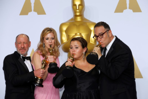Producers Steve Golin, Blye Pagon Faust, Nicole Rocklin and Michael Sugar (L-R) of the Best Picture winning film 