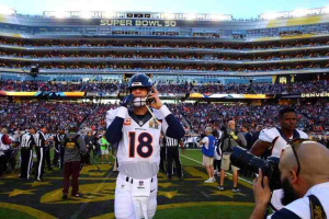 Feb 7, 2016; Santa Clara, CA, USA; Denver Broncos quarterback Peyton Manning (18) puts on his helmet before Super Bowl 50 against the Carolina Panthers at Levi's Stadium.  <br/>Mark J. Rebilas-USA TODAY Sports