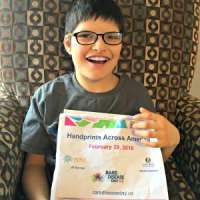 Rare Disease Day 2016 is being observed Feb. 29, with one of the virtual activities being Handprints Across America, hosted by The National Organization for Rare Disorders. Rare diseases affect one in 10 Americans. Ian (shown here) is 10 years old, and has Pitt Hopkins Syndrome (PTHS). PTHS is characterized by developmental delays, gastrointestinal issues, often times lack of speech, hyperventilation/apnea, seizures and distinctive facial features.  <br/>NORD
