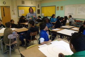Nick Rossi leads his class of seventh graders in a review of what they’ve learned about religion. ''I want you to know it,'' he says. ''Because in our community, we have people that belong to basically every religion that we’re studying.'' Nashville Public Radio (Chas Sisk/WPLN)  <br/>