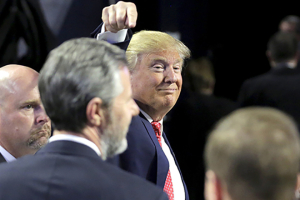 Jerry Falwell Jr.’s endorsement of GOP presidential candidate Donald Trump draws objections from his late father’s confidant, David DeMoss, who sits on the Liberty University board. Picture shows Trump pointing at Falwell at Liberty University on Tuesday, Jan. 26, 2016, just days before Iowa caucuses. Reuters <br/>