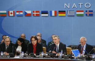 Georgia's Minister of Defence Tinatin Khidasheli (L) and NATO Secretary General Jens Stoltenberg (R) address a NATO-Georgia Commission defense ministers meeting at the Alliance's headquarters in Brussels February 11, 2016.  <br/>REUTERS/Yves Herman