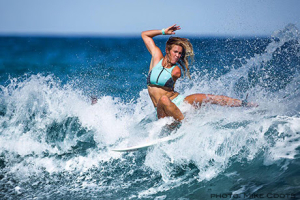 Pro surfer Bethany Hamilton, who lost an arm to a shark attack in 2003, is helping children face life-threatening illnesses through annual Make-A-Wish Surf Camps in Hawaii.  <br/>Mike Coots courtesy of Bethany Hamilton