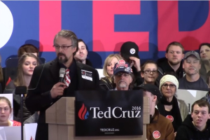 Screenshot from coverage of Tim Remington at a campaign rally for Ted Cruz.  <br/>YouTube / Redoubt News