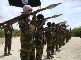 Al Shabaab militants parade new recruits after arriving in Mogadishufrom their training camp south of the capital in this October 21, 2010 file photo. The United States has carried out an air strike in Somalia, killing more than 150 fighters with the al Qaeda-linked Islamist group al Shabaab, following U.S. intelligence on preparations for a large-scale militant attack, the Pentagon said on March 7, 2016. REUTERS/Feisal Omar/Files <br/>